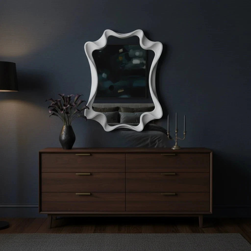 Dark room with wooden dresser, decorative mirror, and lamp.