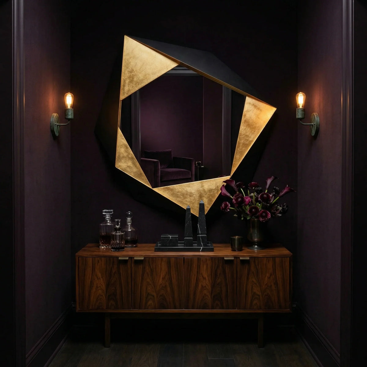 Ambella Home Folded Mirror in black and gold, 48W x 5D x 49H geometric wall mirror above a walnut credenza in a dark luxury hallway