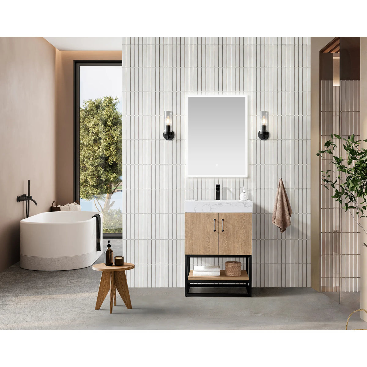 Lifestyle shot of the 24 inch vanity in a tiled bathroom with a soaking tub, wall mirror and wooden stool