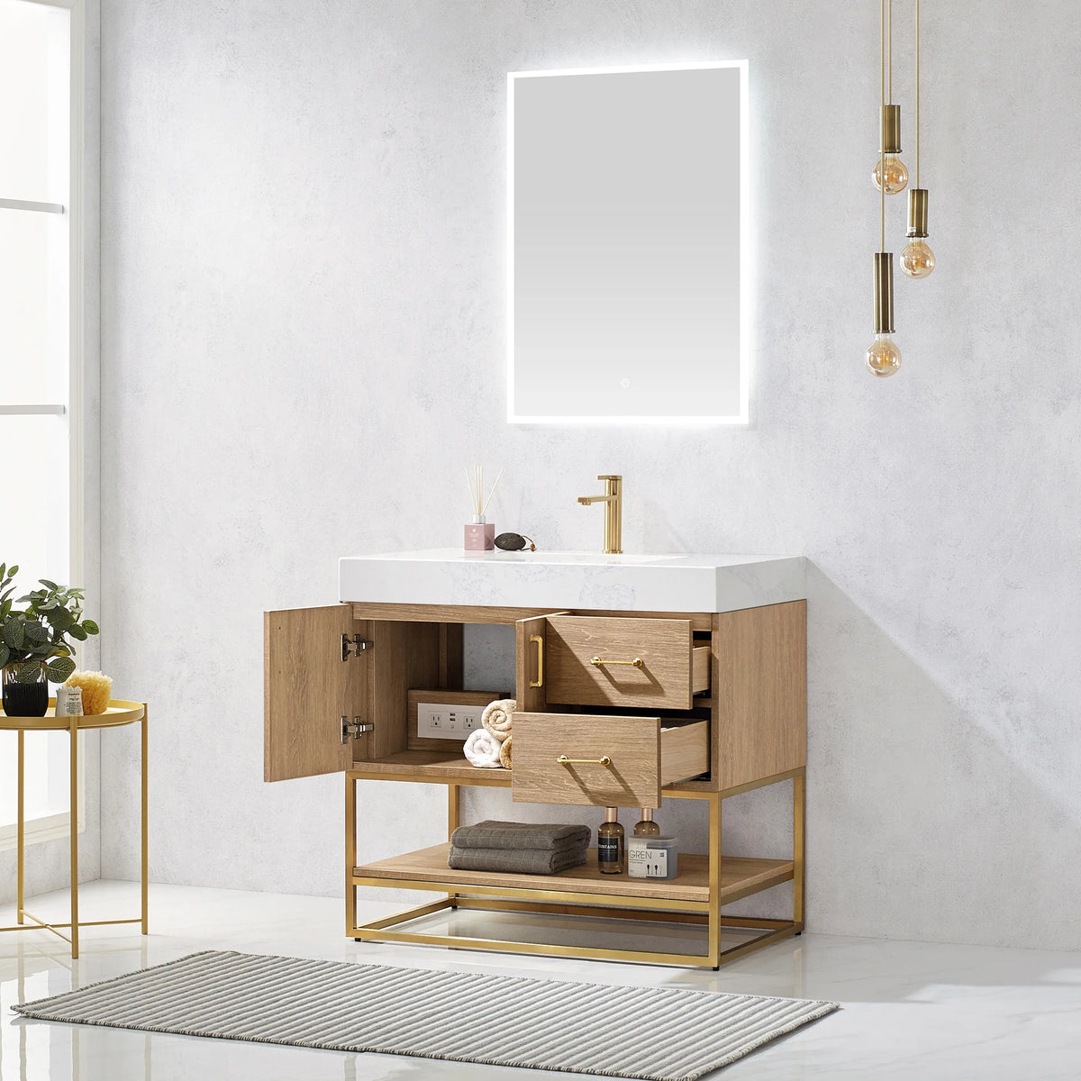 Open view of the vanity with a door and a drawer open, towels visible, pendant bulbs above