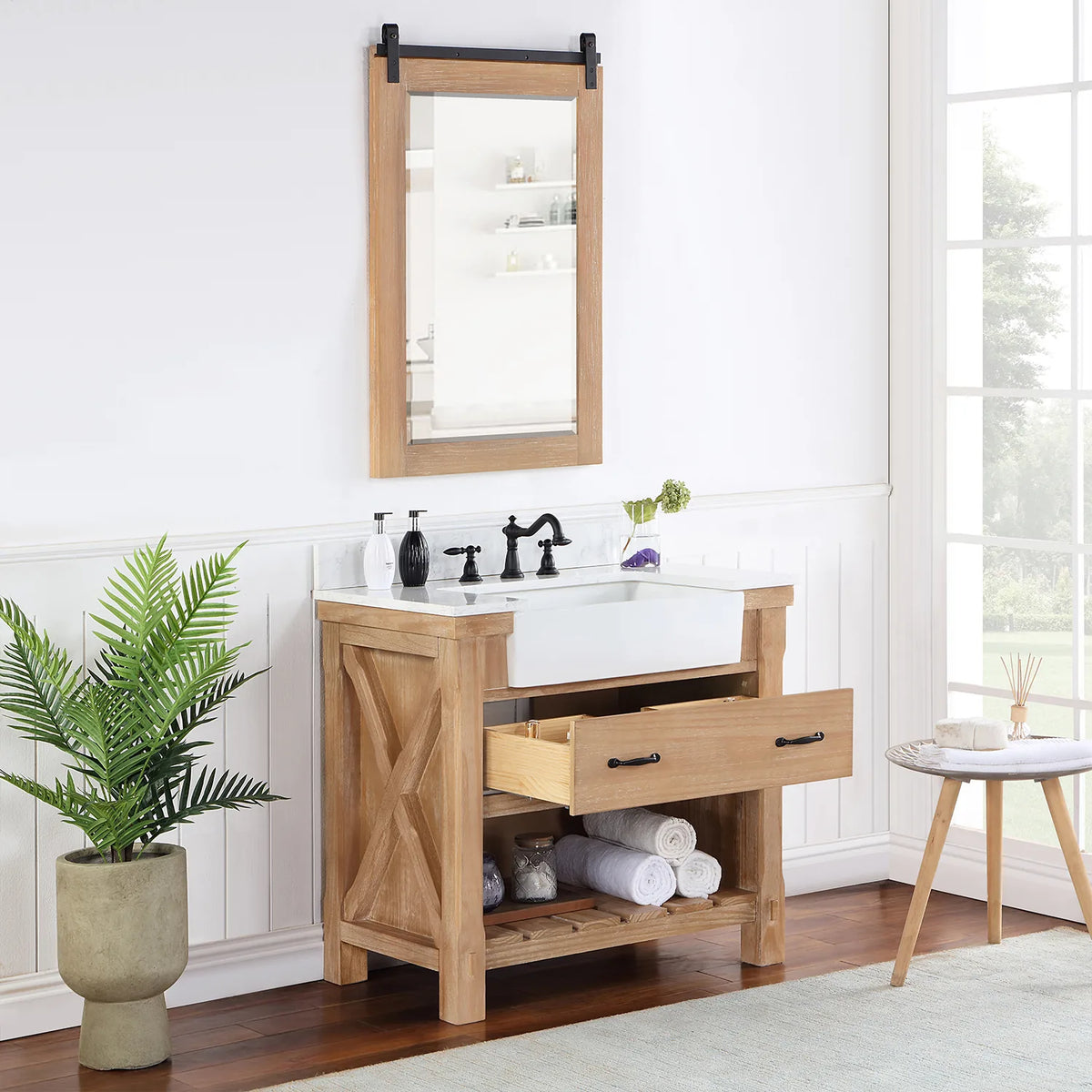 Room view with the mirror above and the drawer open on the Weathered Pine vanity