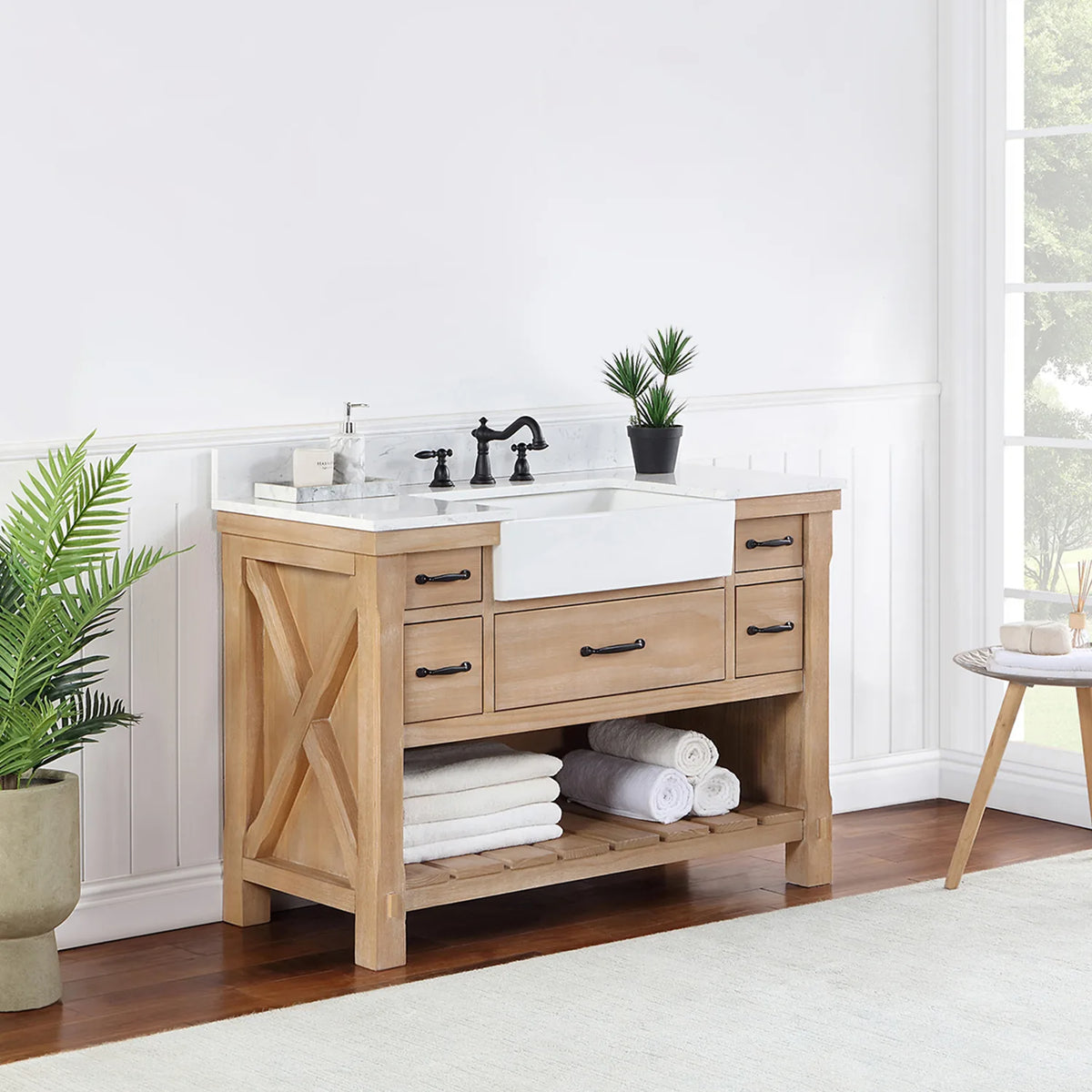 Side-angle shot of the crossed brace on the vanity side panel and the slatted open shelving