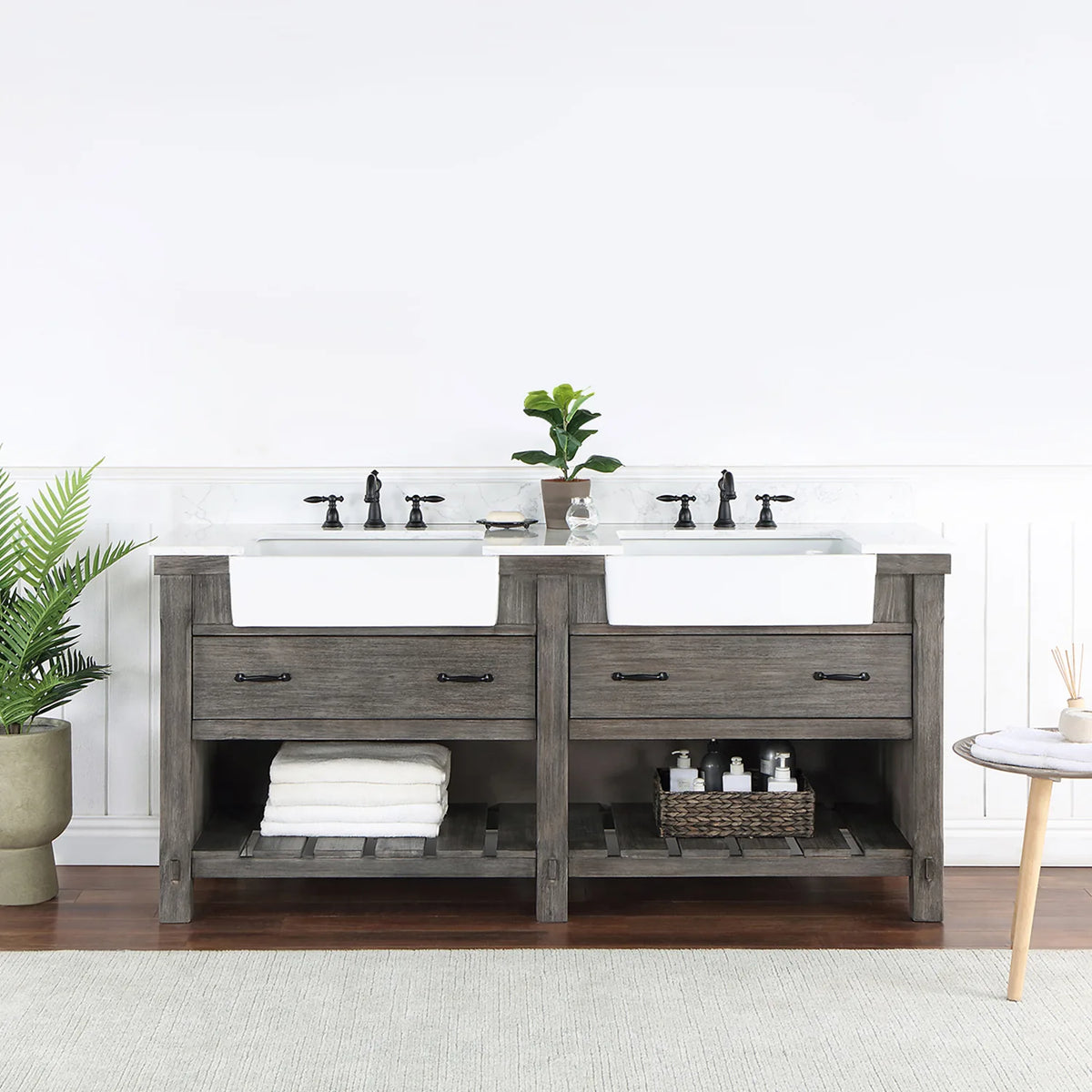 Bathroom setting with white paneled wall, fern and side table beside the vanity