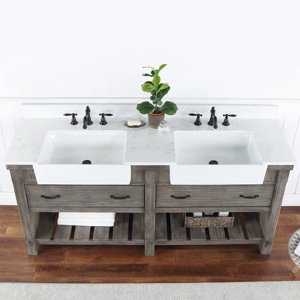Overhead crop: stone surface with black pulls on the drawers below