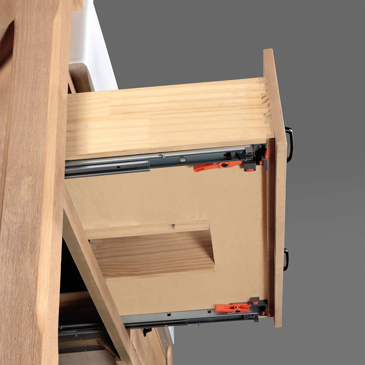 Full-extension drawer glide in close view with dovetailed wood box