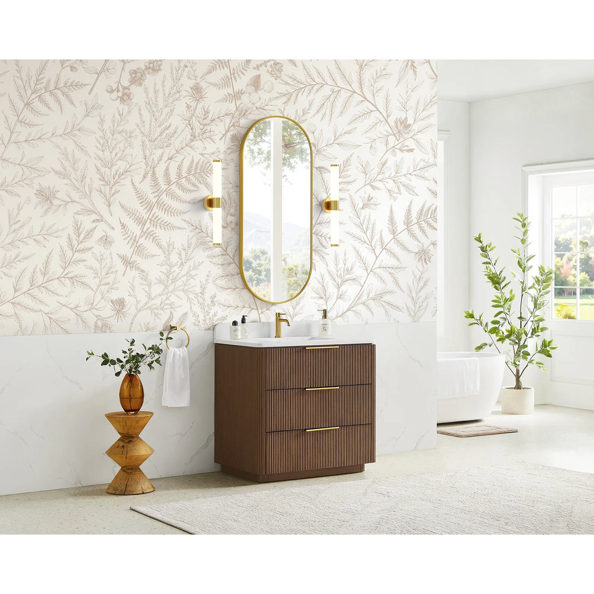 Bathroom scene with a 36 inch single sink vanity, botanical leaf wallpaper behind it