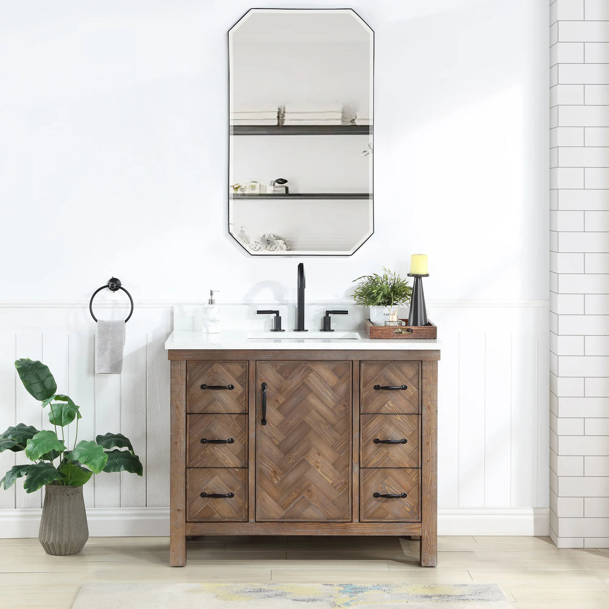 42 inch Spruce Antique Gray vanity in a bright white-tiled bathroom with an octagon wall mirror and a towel ring