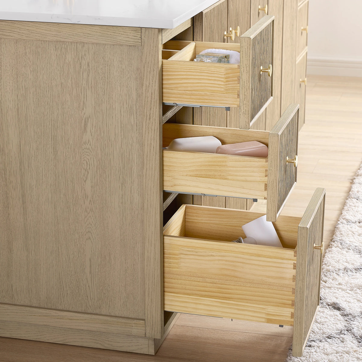 Side drawers pulled open on the 84-inch double vanity in Aged Natural Oak