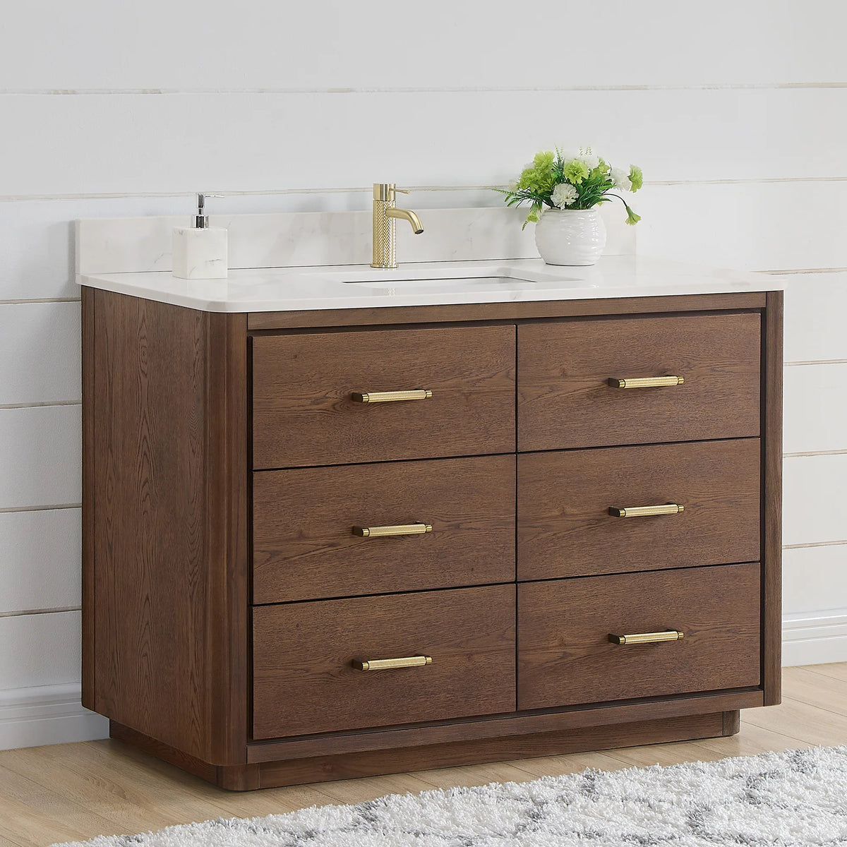 Angled room view of a 48 inch single vanity in Aged Dark Brown Oak with brushed gold pulls