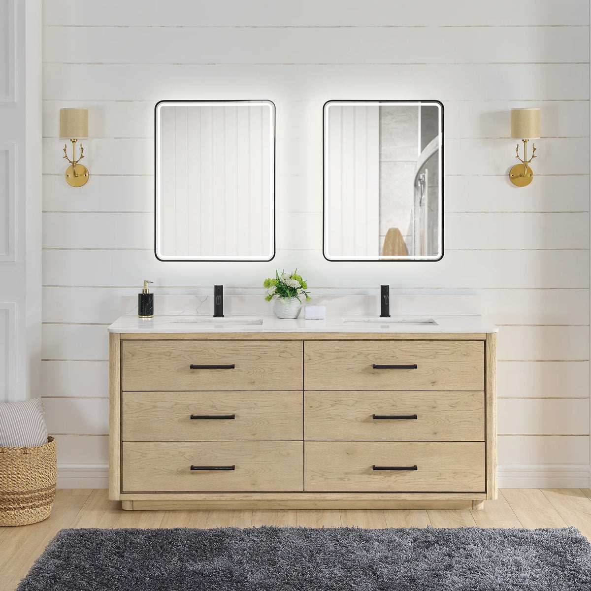 Room scene: Aged Natural Oak double vanity, two LED mirrors lit above it and sconces at the sides