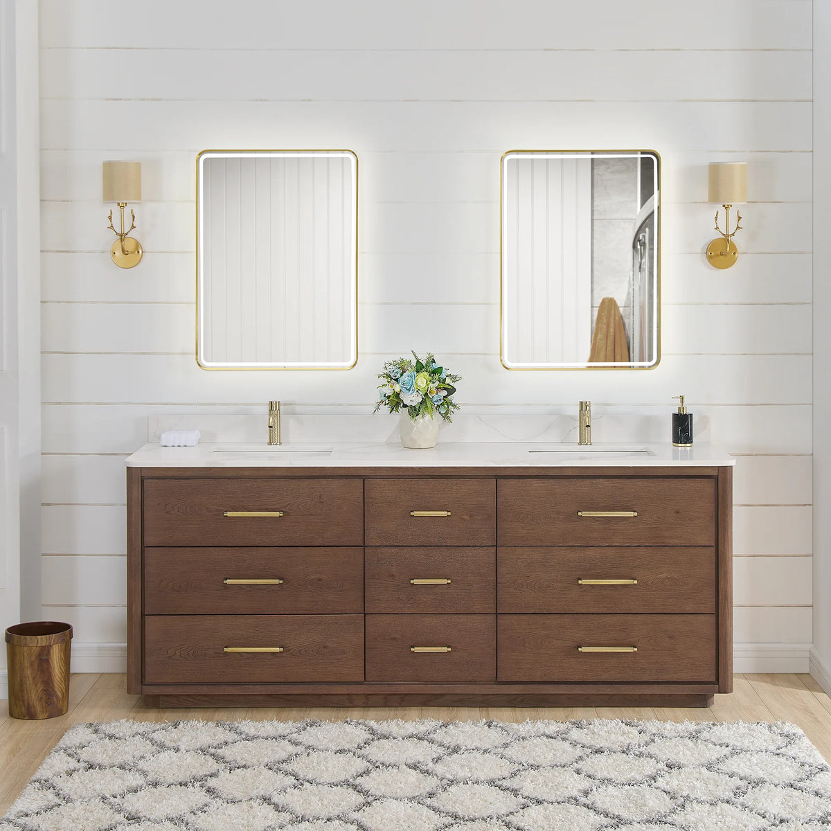 84 inch double vanity in Aged Dark Brown Oak with two LED mirrors, shown in a bathroom with gold wall sconces