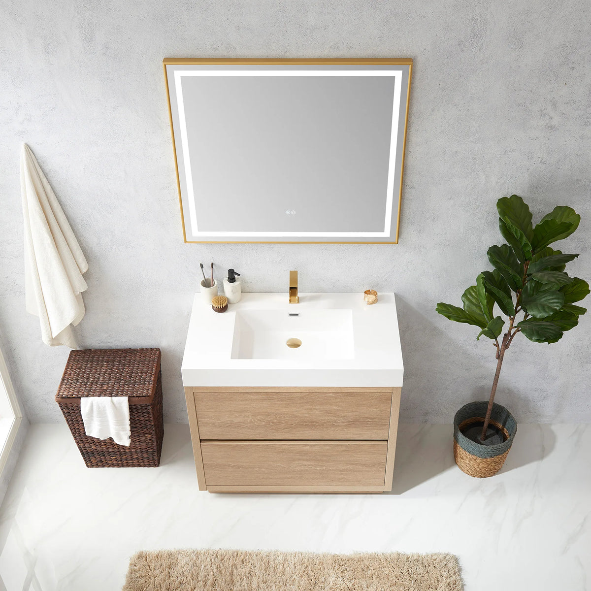 High-angle view of the 36 inch vanity with LED mirror above and plant at right
