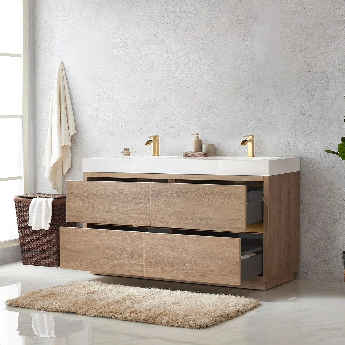 Double vanity with drawers pulled open, gray interiors visible, hamper and plant in the room