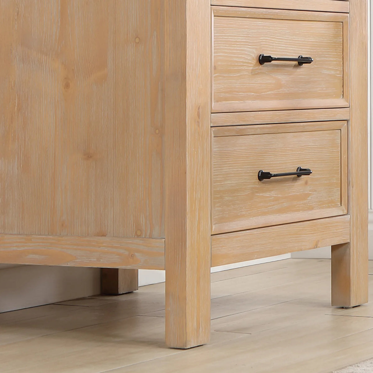 Tight crop of the drawer fronts and their pulls in Fir Wood Brown