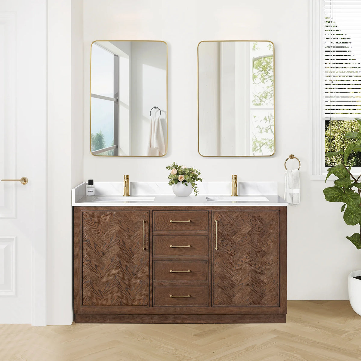 Bathroom scene with the 60-inch double vanity, its matching pair of mirrors and a towel ring, plus a flower arrangement