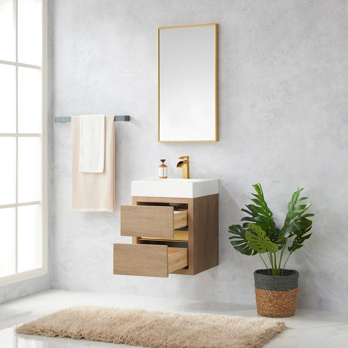 Open soft-close drawers on the 18 inch North American Oak floating vanity, set in a bathroom scene