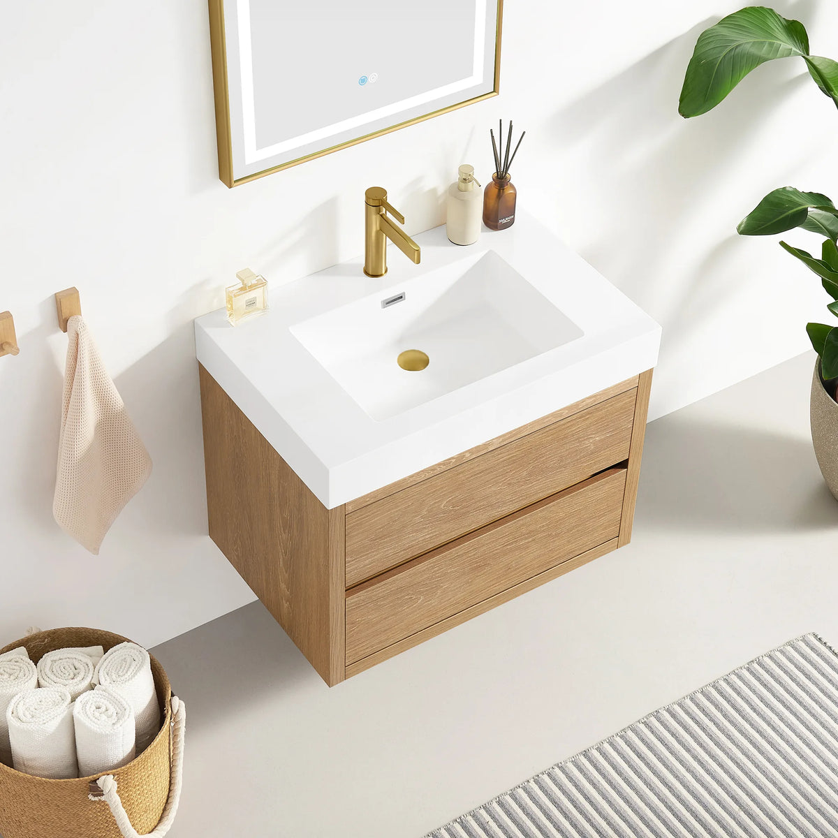 30 inch wall-mount vanity from above, integrated sink top with a rolled-towel basket at its side