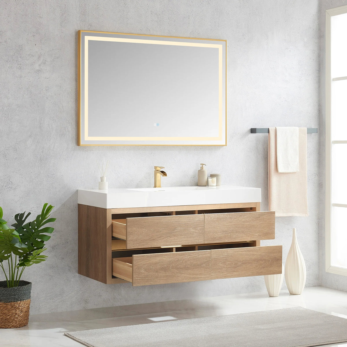 Wall-mount 48 inch vanity with open drawers under an LED mirror in a light bathroom