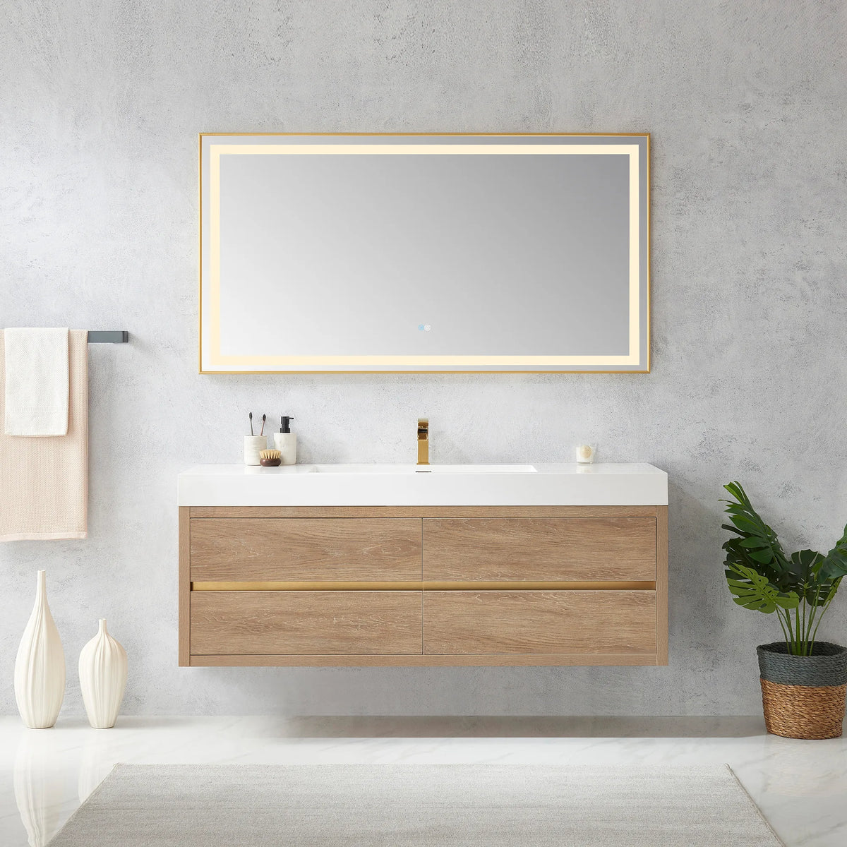 60 inch floating vanity in North American Oak under a wide rectangular LED mirror, with a towel bar and tall vases