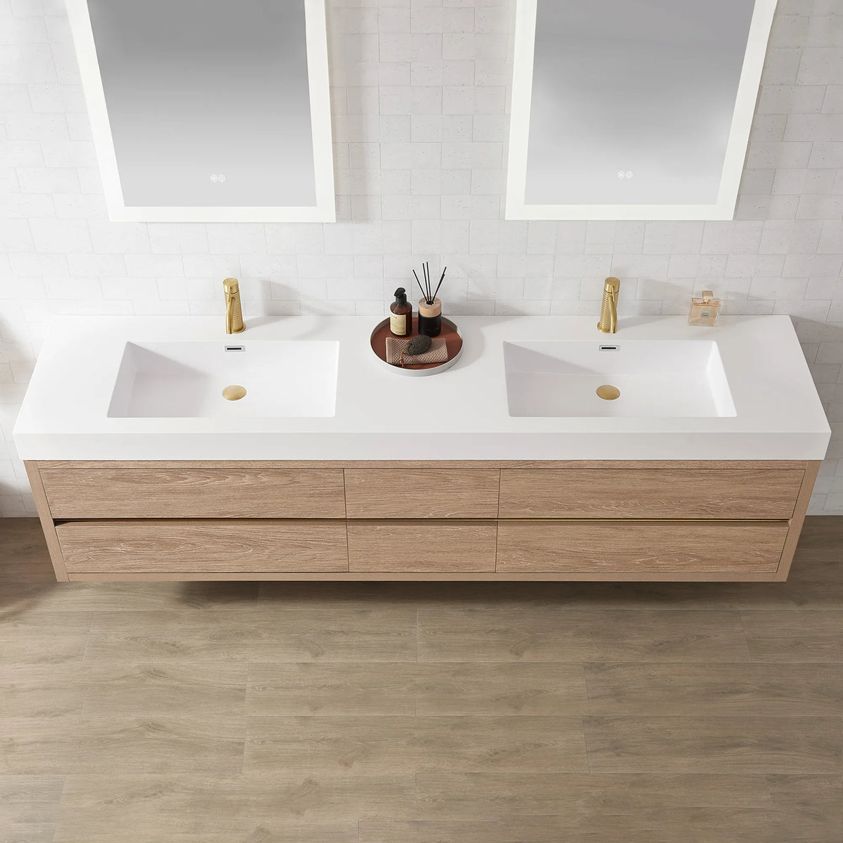 Detail of both integrated basins and the cabinet front, mirror bottoms at the top of the shot