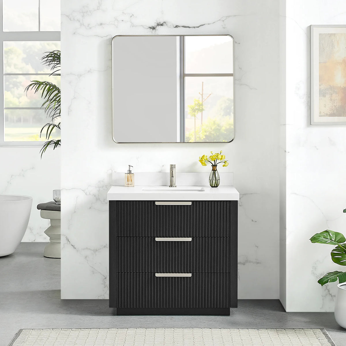 Wall mirror above the 36 inch Oak Weathered Black single vanity, quartz top and three drawers in a bright bathroom
