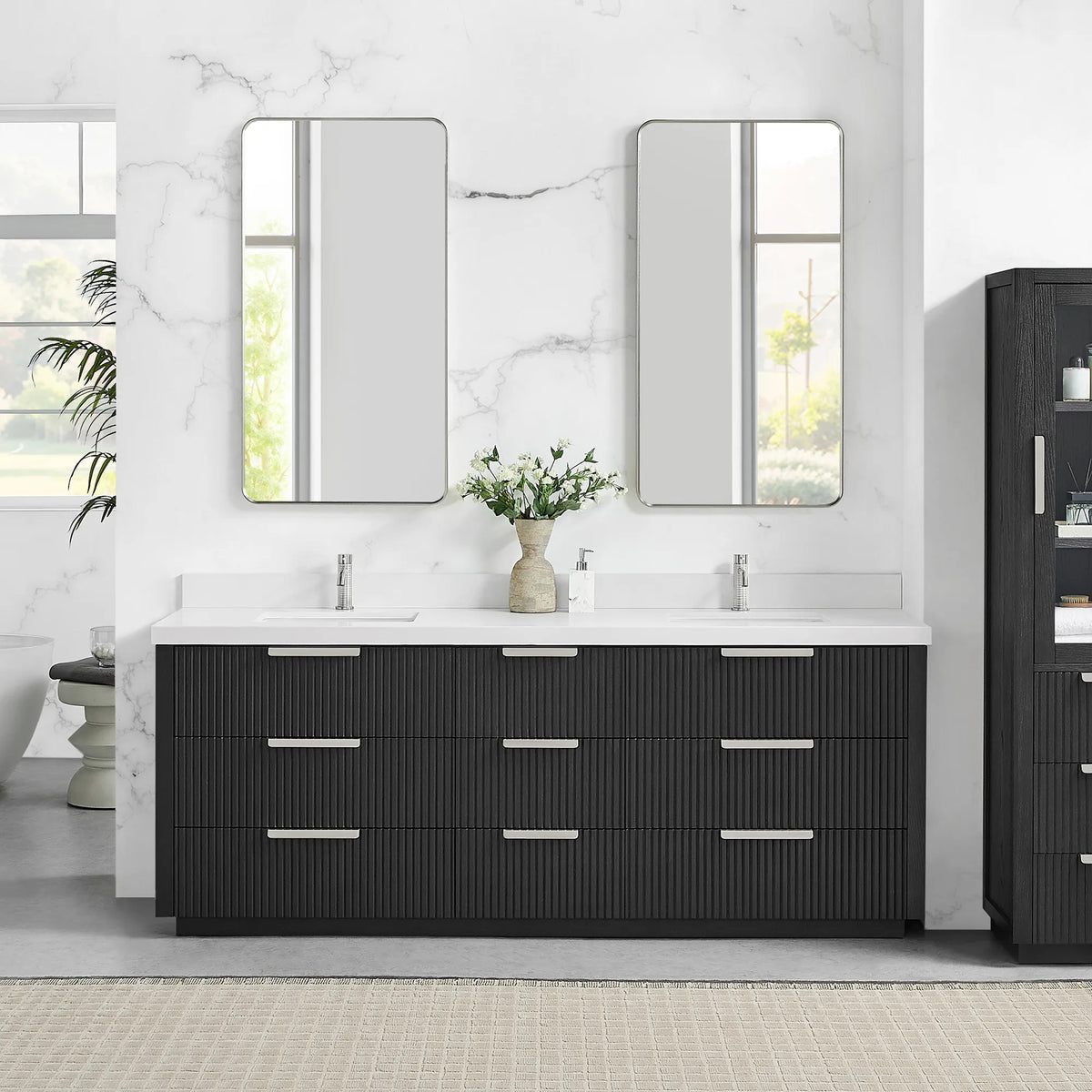 Two wall mirrors above the 84 inch Oak Weathered Black double vanity, quartz top and nine drawers
