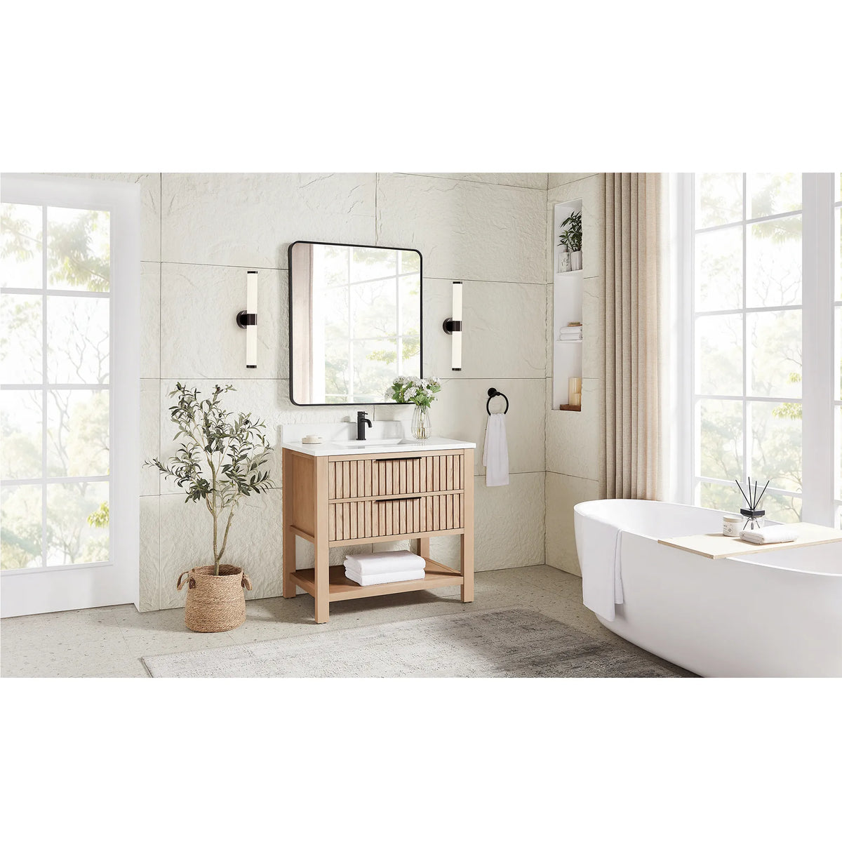 Wide room shot with a tub and window light behind the 36-inch Aged Natural Oak vanity