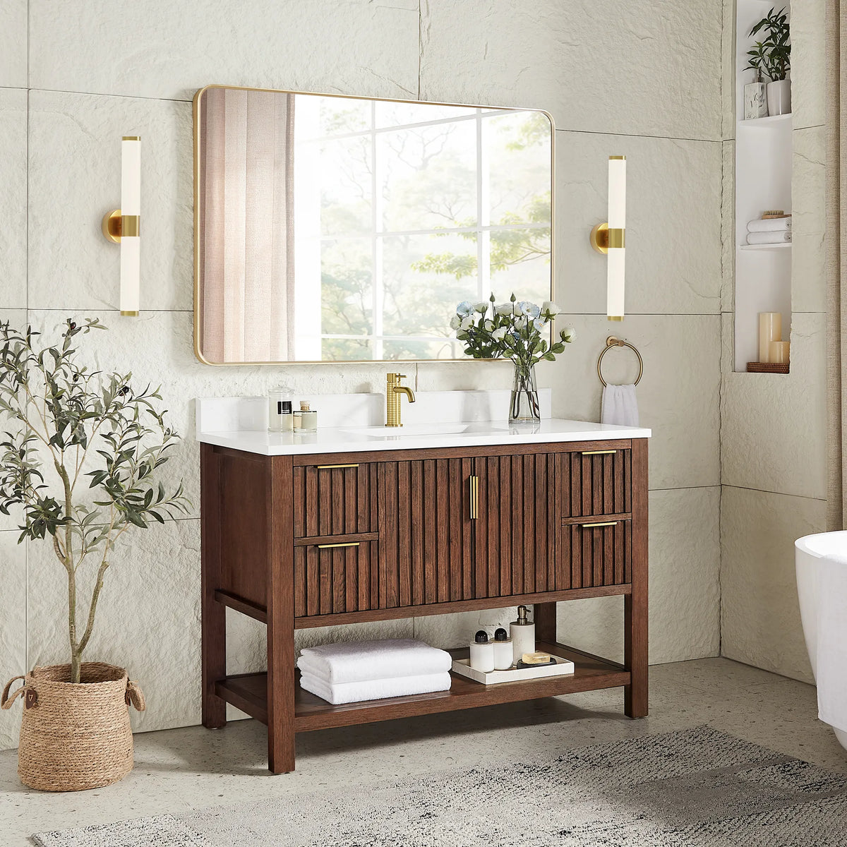Second angle: 48-inch cabinet in Aged Dark Brown Oak with a matching rectangular mirror in a gold frame and a plant
