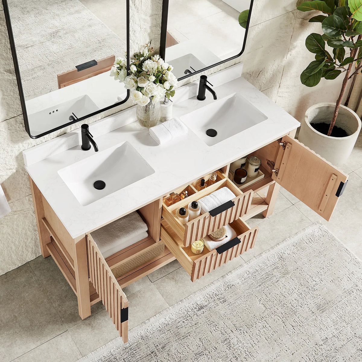 Storage on view in a staged room: 60-inch Aged Natural Oak cabinet with doors and drawers open