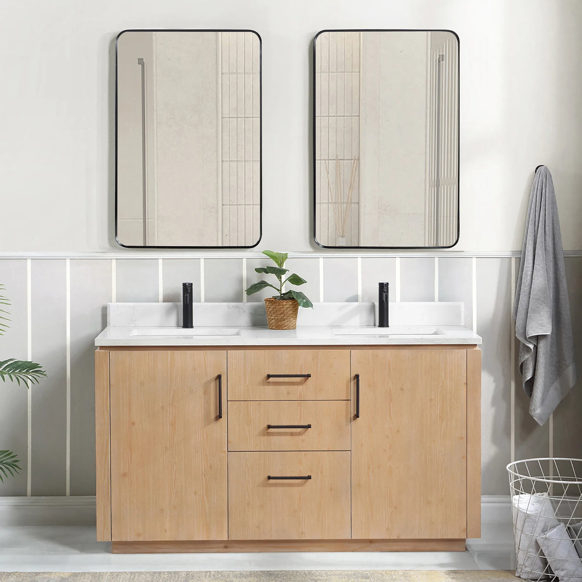 Bathroom scene with a 60 inch Fir Wood Brown vanity, tall framed mirrors, striped wall and wire laundry basket