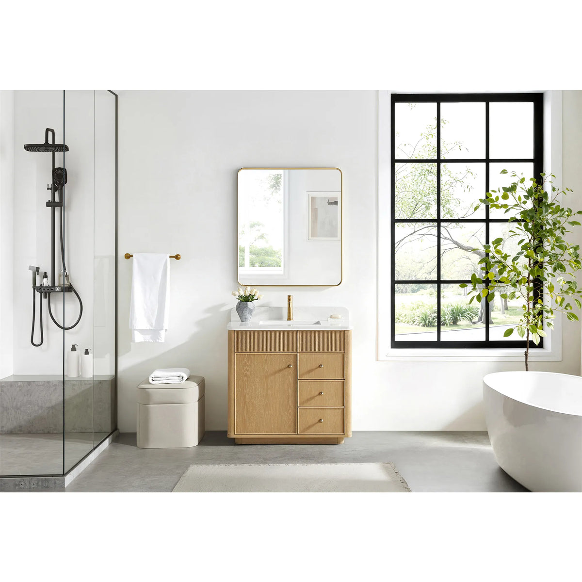 Full room setting for the 36 inch vanity in Washed Ash Grey, a glass shower on one side and a tub on the other