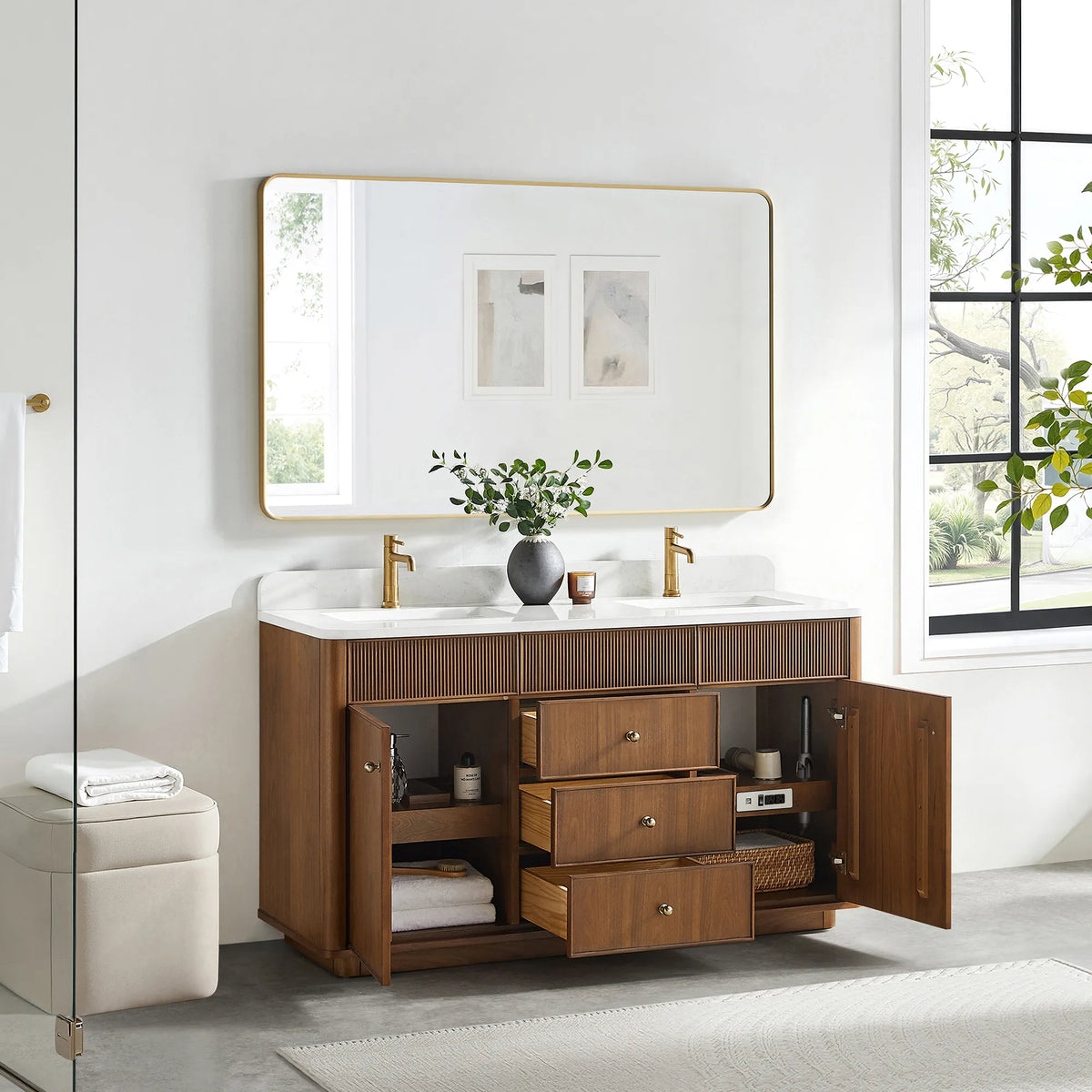 Natural Walnut double vanity in a bathroom with doors and drawers open, towels folded on the shelves inside