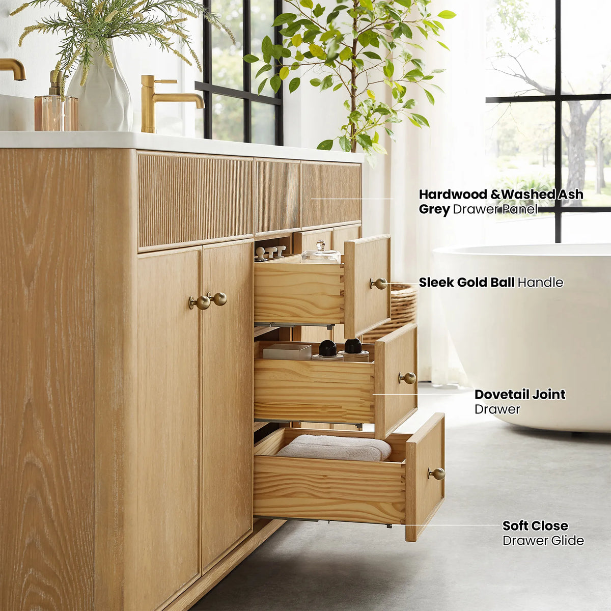 Angled side view of three open drawers with labels for handle, dovetail joint and soft-close glide