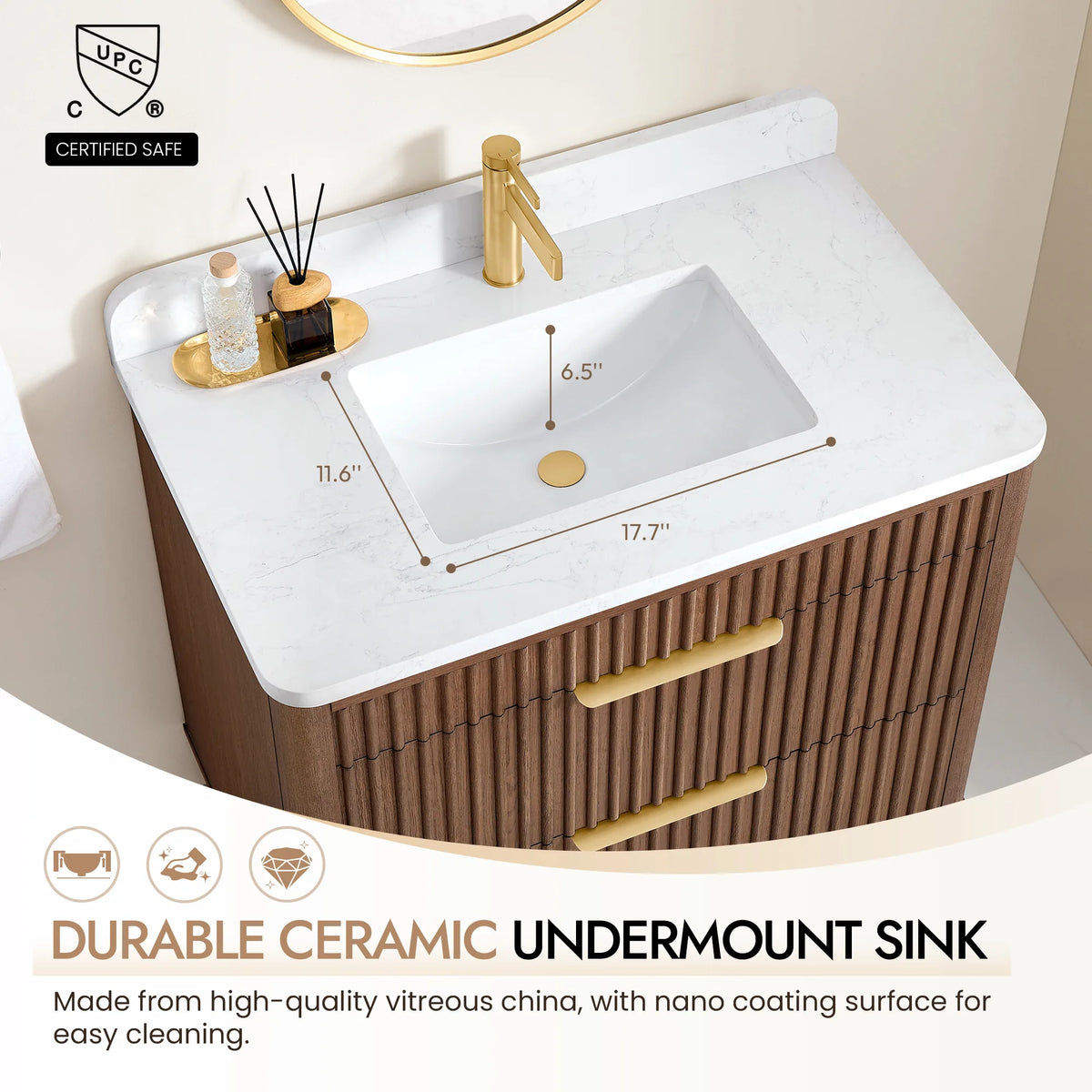 Callout on the ceramic undermount sink in the 36-inch vanity's veined top, with a gold faucet above it