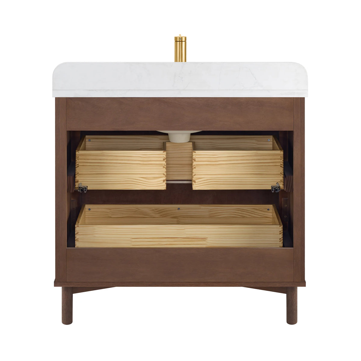 Inside the 36-inch cabinet with the drawer fronts out of view: two boxes above a wider one, and the sink drain