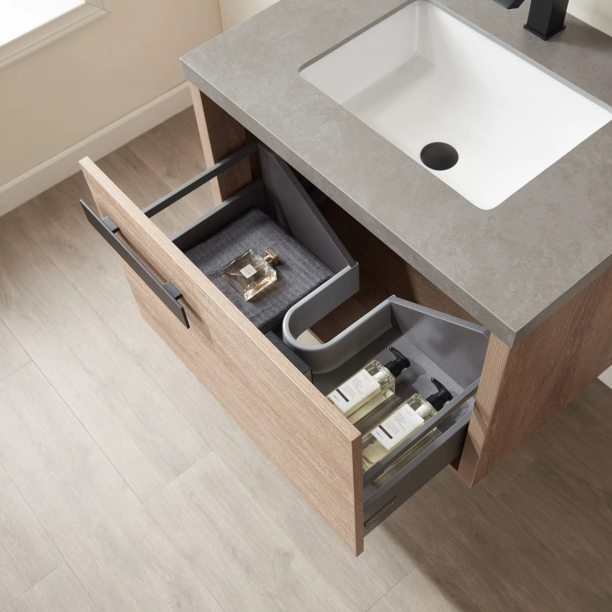 Drawer pulled forward, grey divided insert visible from above