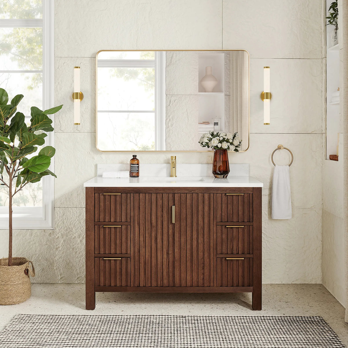 Staged room pairing a matching rectangular mirror in a gold frame with the 48-inch vanity in Aged Dark Brown Oak