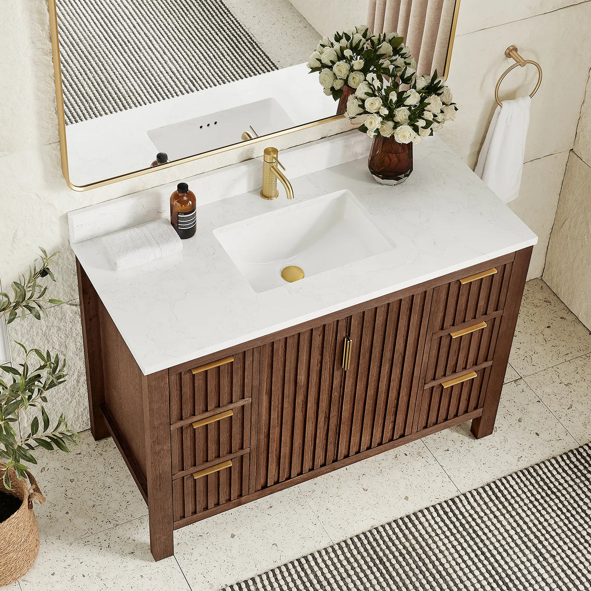 Top-down angle: a stone-composite top and ceramic undermount basin on the 48-inch Aged Dark Brown Oak cabinet