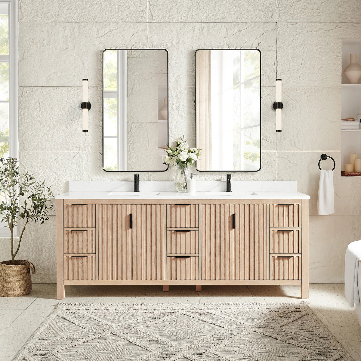 Two rectangular mirrors in black frames hung over the 84-inch Aged Natural Oak cabinet
