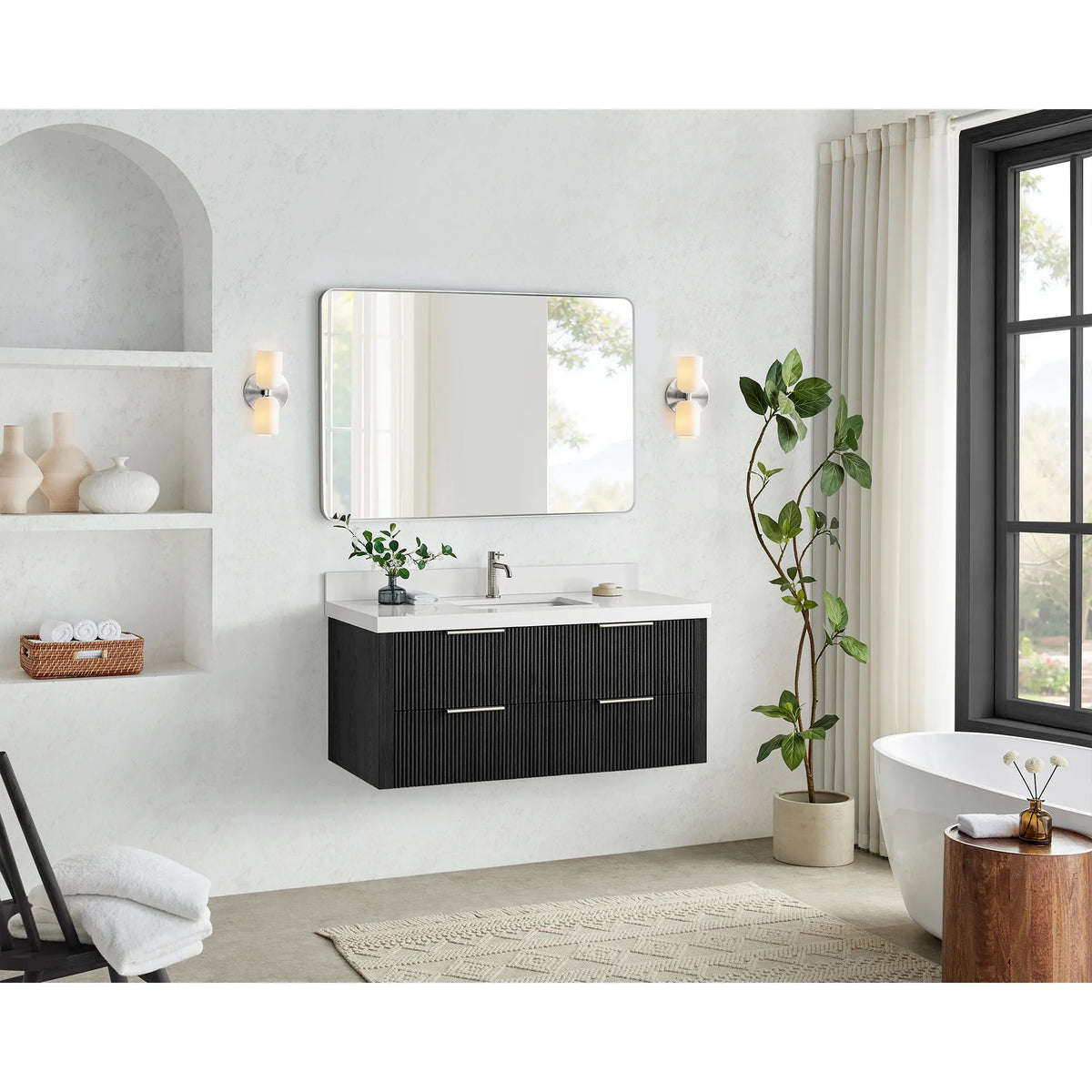48 inch floating vanity in Oak Weathered Black, hung in a bright bathroom with a window, arched niche and soaking tub