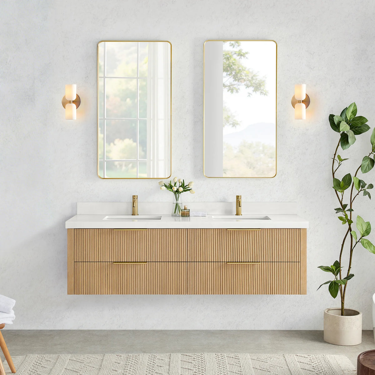Wall-hung vanity in Washed Ash Grey with two tall mirrors set between two wall sconces on a textured wall