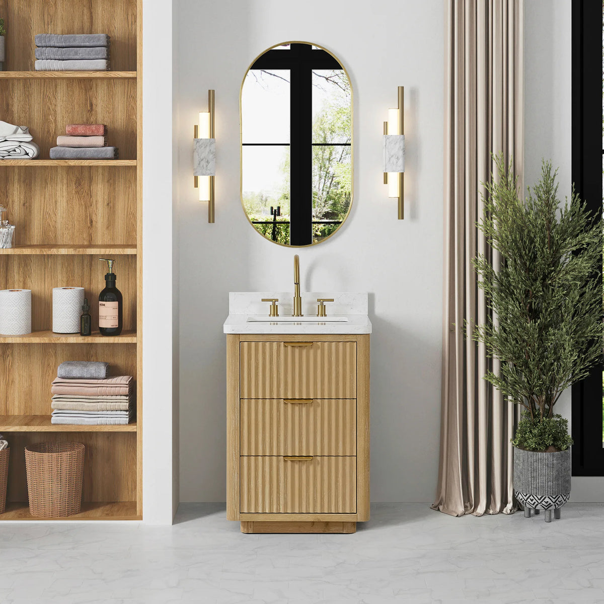 24 inch wood vanity in a bright bathroom with a potted plant, shelving unit and oval wall mirror