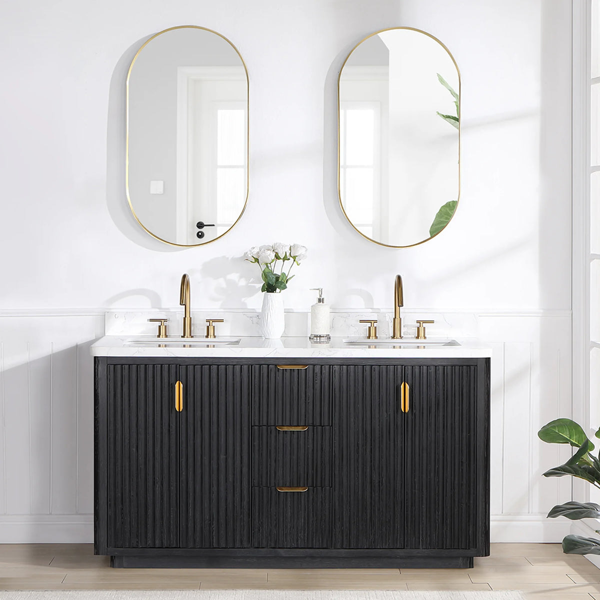 Room scene: 60 inch double vanity below two oval wall mirrors, with a plant at the right and window light
