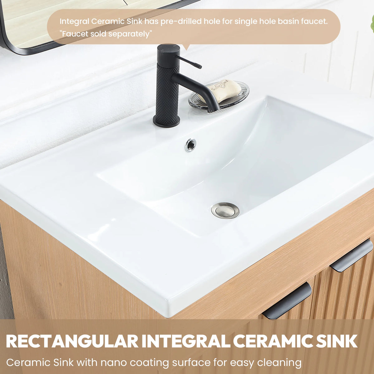 Rectangular ceramic sink and drain shown as a feature close-up; faucet not included
