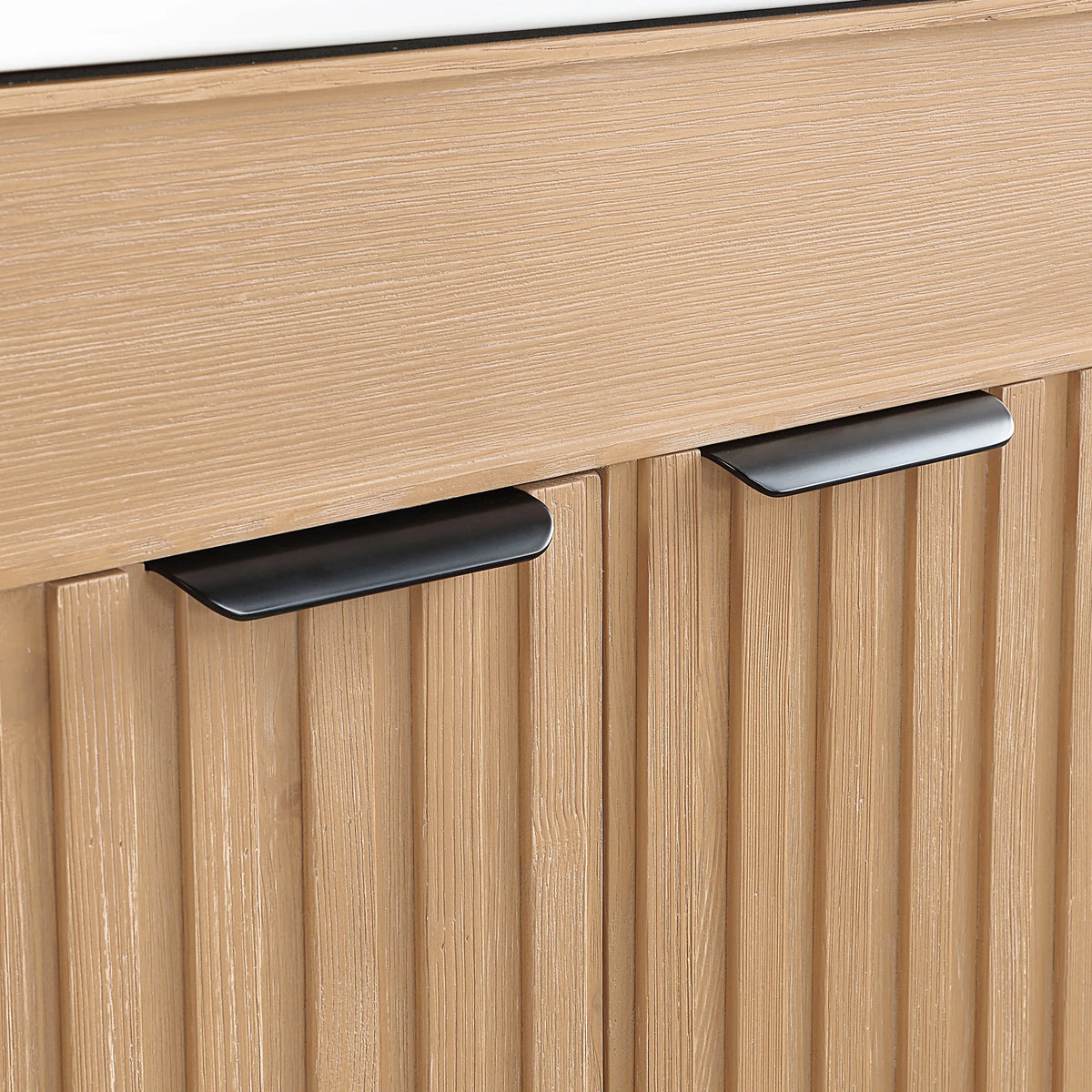 Macro: matte black hardware on a Fir Wood Brown cabinet door