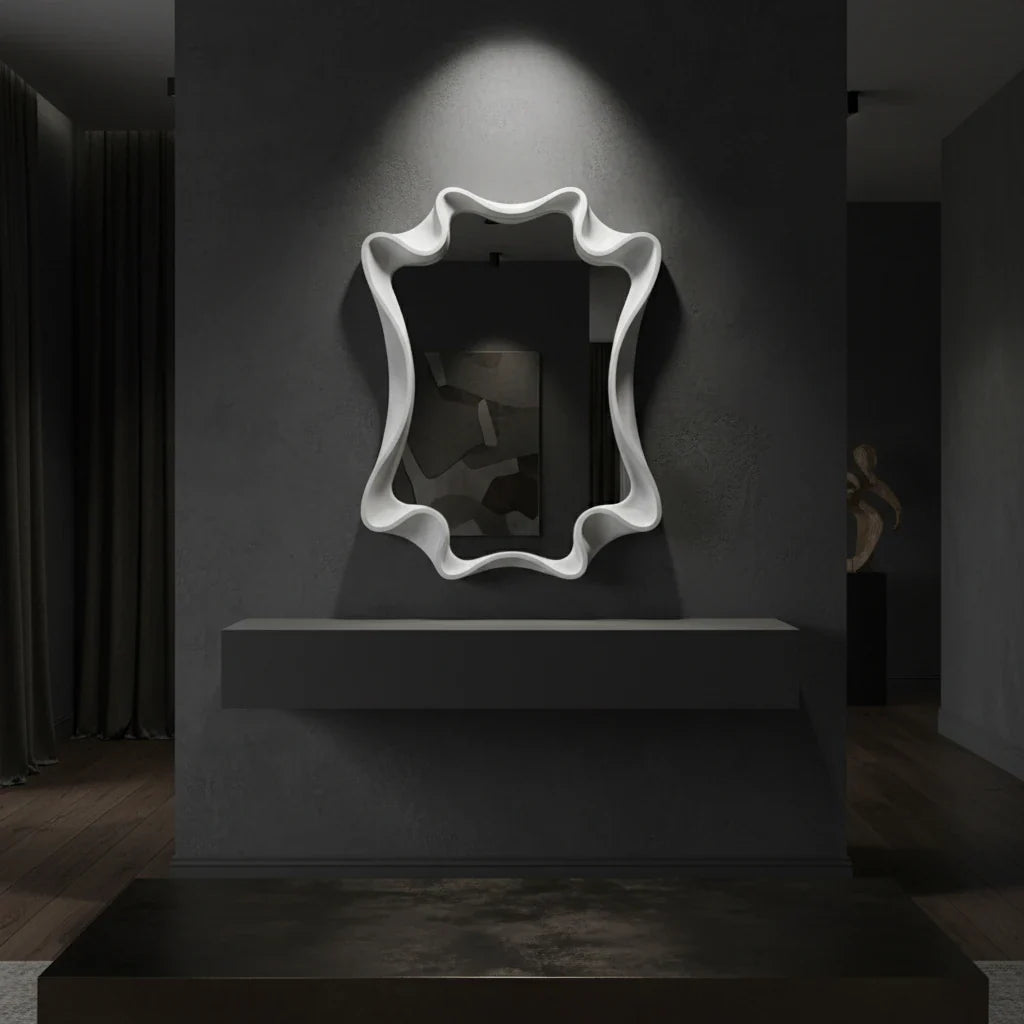 Decorative wall mirror with wavy frame on a dark wall