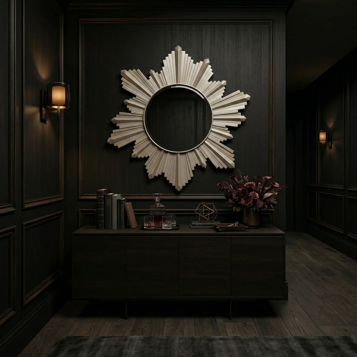 Ambella Home Vassar Mirror in champagne finish, 37W x 2D x 40H sunburst wall mirror above a dark credenza in a luxury paneled hallway
