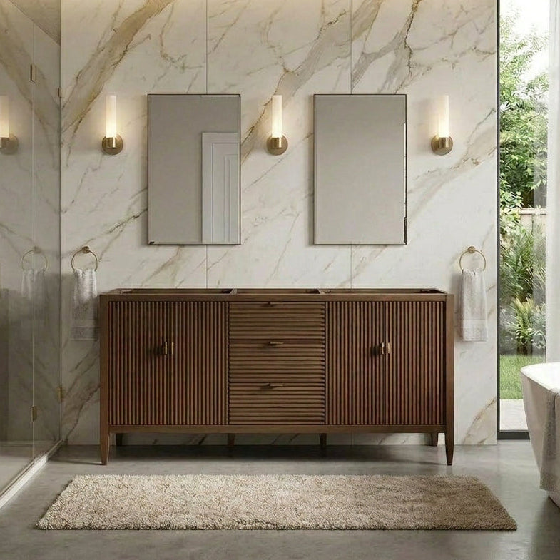 Modern bathroom with wooden vanity without a top, marble walls, and a freestanding bathtub.