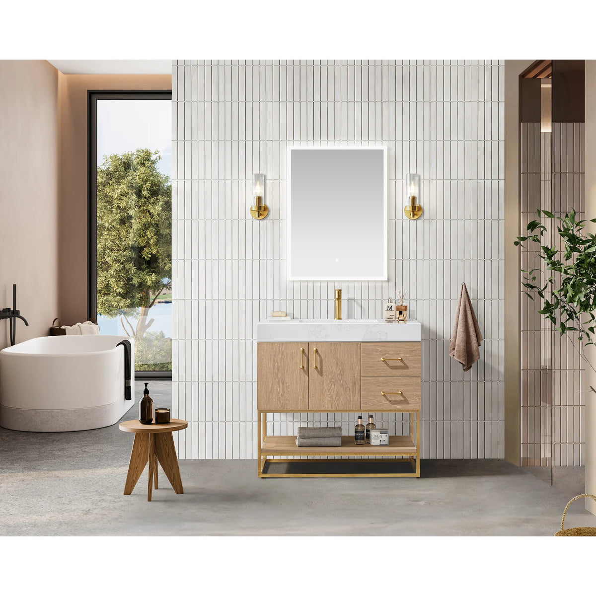 Lifestyle shot of the vanity in a tiled bathroom with a soaking tub, wall mirror and wooden stool