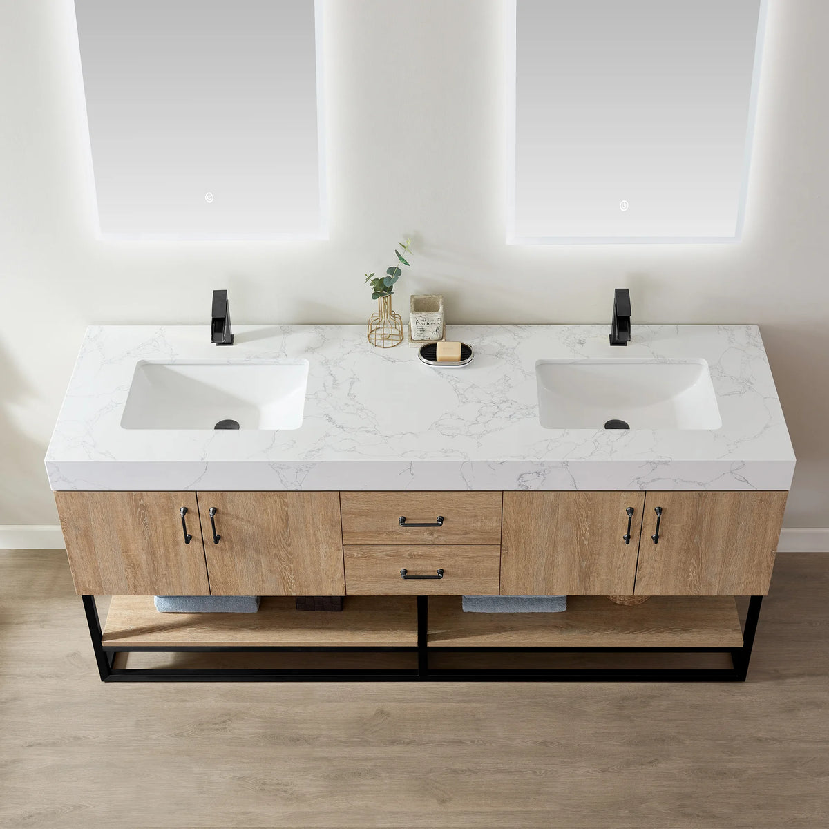 Angled close-up of the white grain stone top and its undermount ceramic sink area, with a decor tray